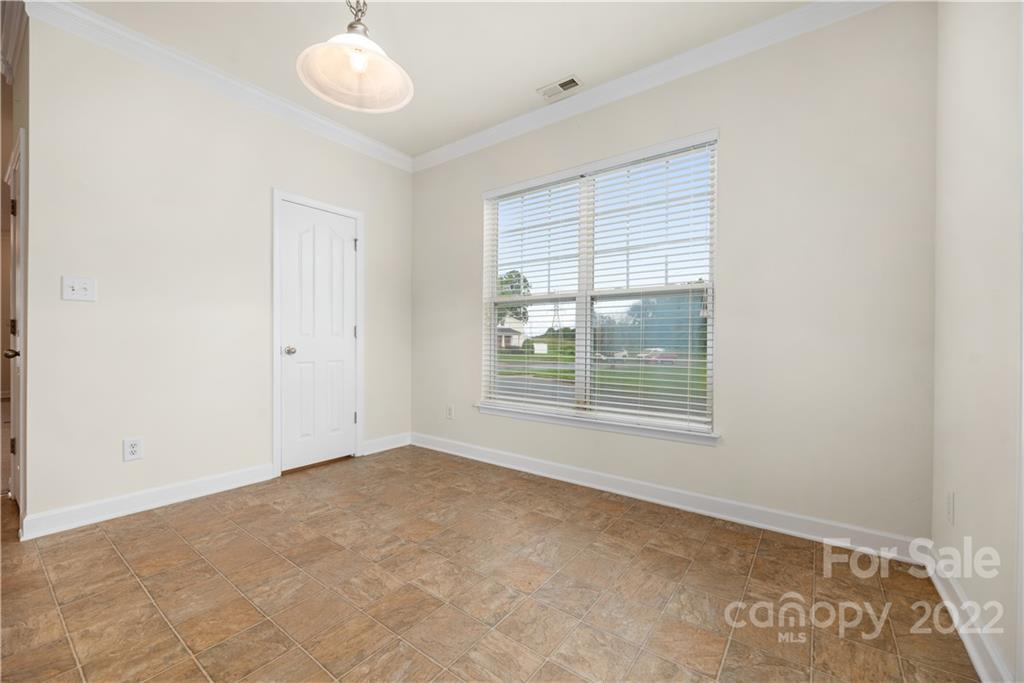 5133 Prosperity Church Road Charlotte, NC 28269 - Photo 15 of 37 an empty room with window
