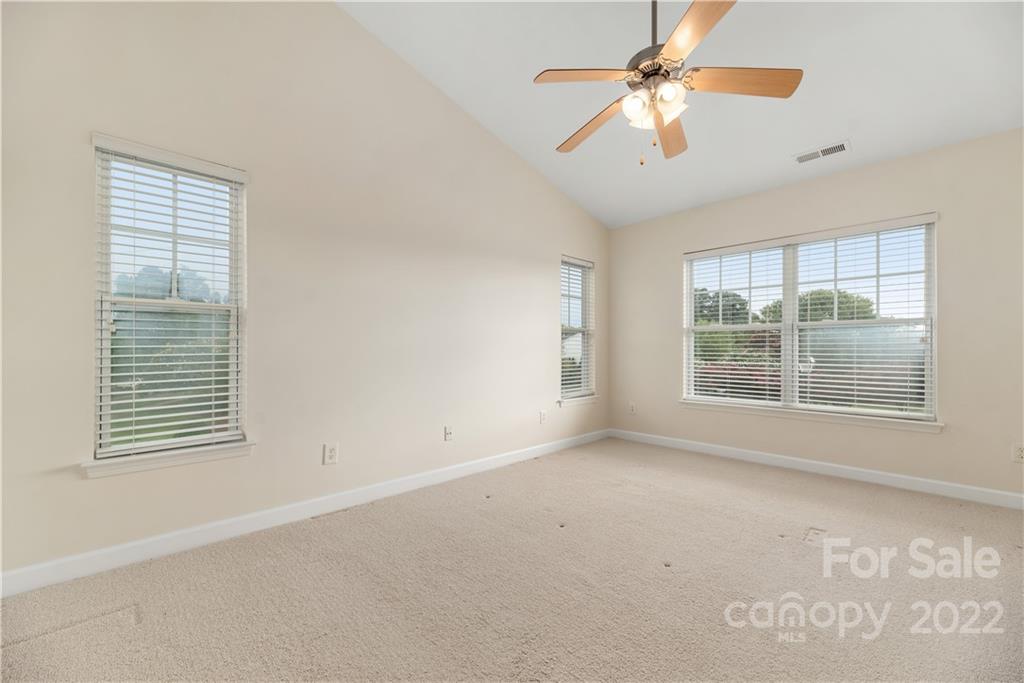 5133 Prosperity Church Road Charlotte, NC 28269 - Photo 17 of 37 a view of an empty room with a window