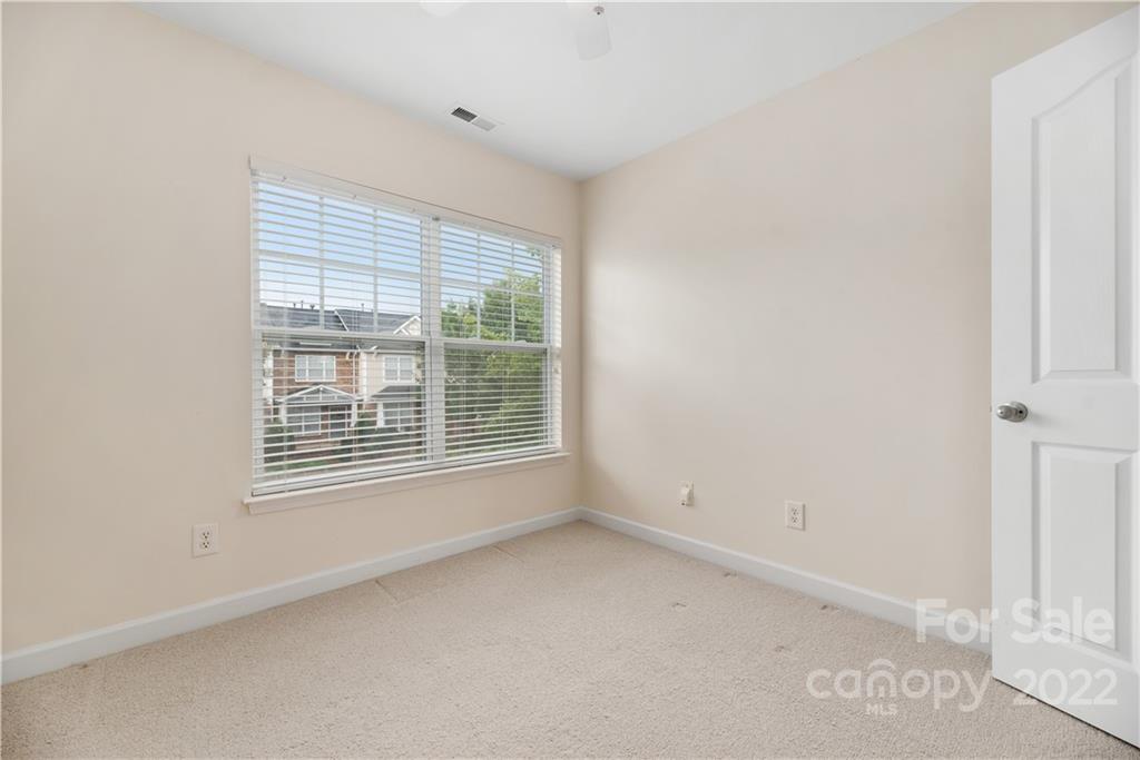 5133 Prosperity Church Road Charlotte, NC 28269 - Photo 29 of 37 an empty room with a window