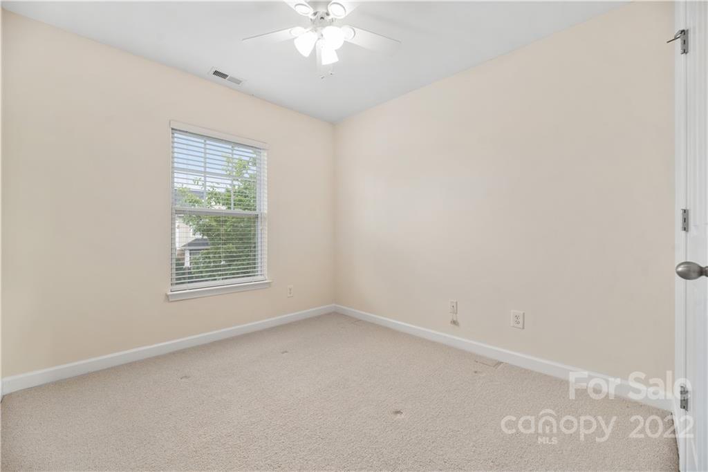 5133 Prosperity Church Road Charlotte, NC 28269 - Photo 30 of 37 an empty room with a window