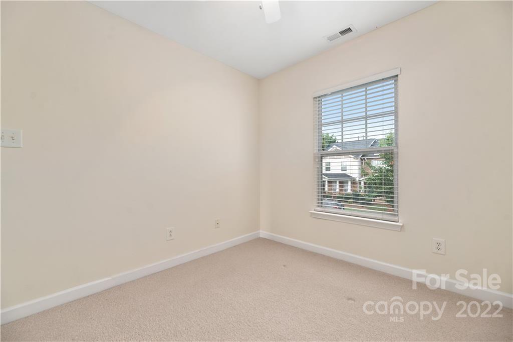 5133 Prosperity Church Road Charlotte, NC 28269 - Photo 31 of 37 an empty room with a window