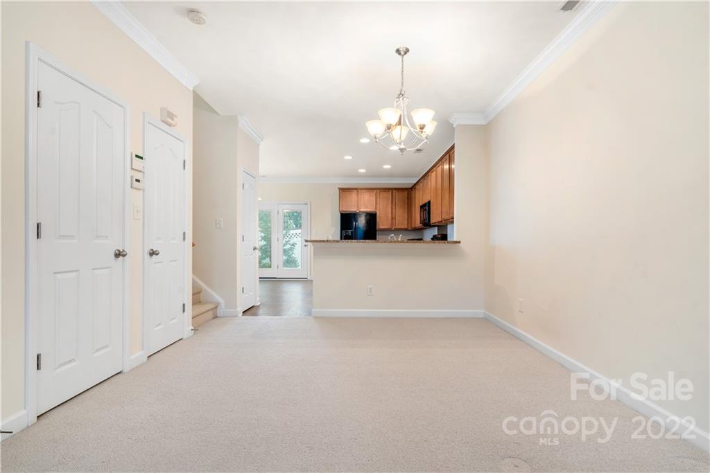 5133 Prosperity Church Road Charlotte, NC 28269 - Photo 8 of 37 a view of a kitchen and a window
