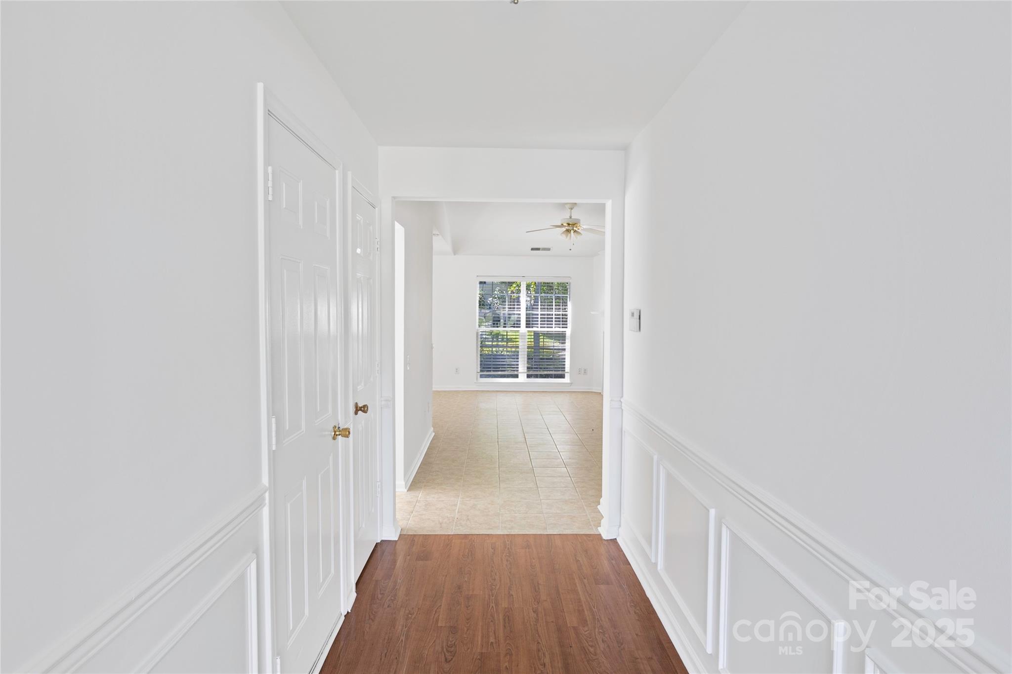 14034 Dingess Road, Unit 101 Charlotte, NC 28273 - Photo 11 of 24 a view of a hallway with wooden floor