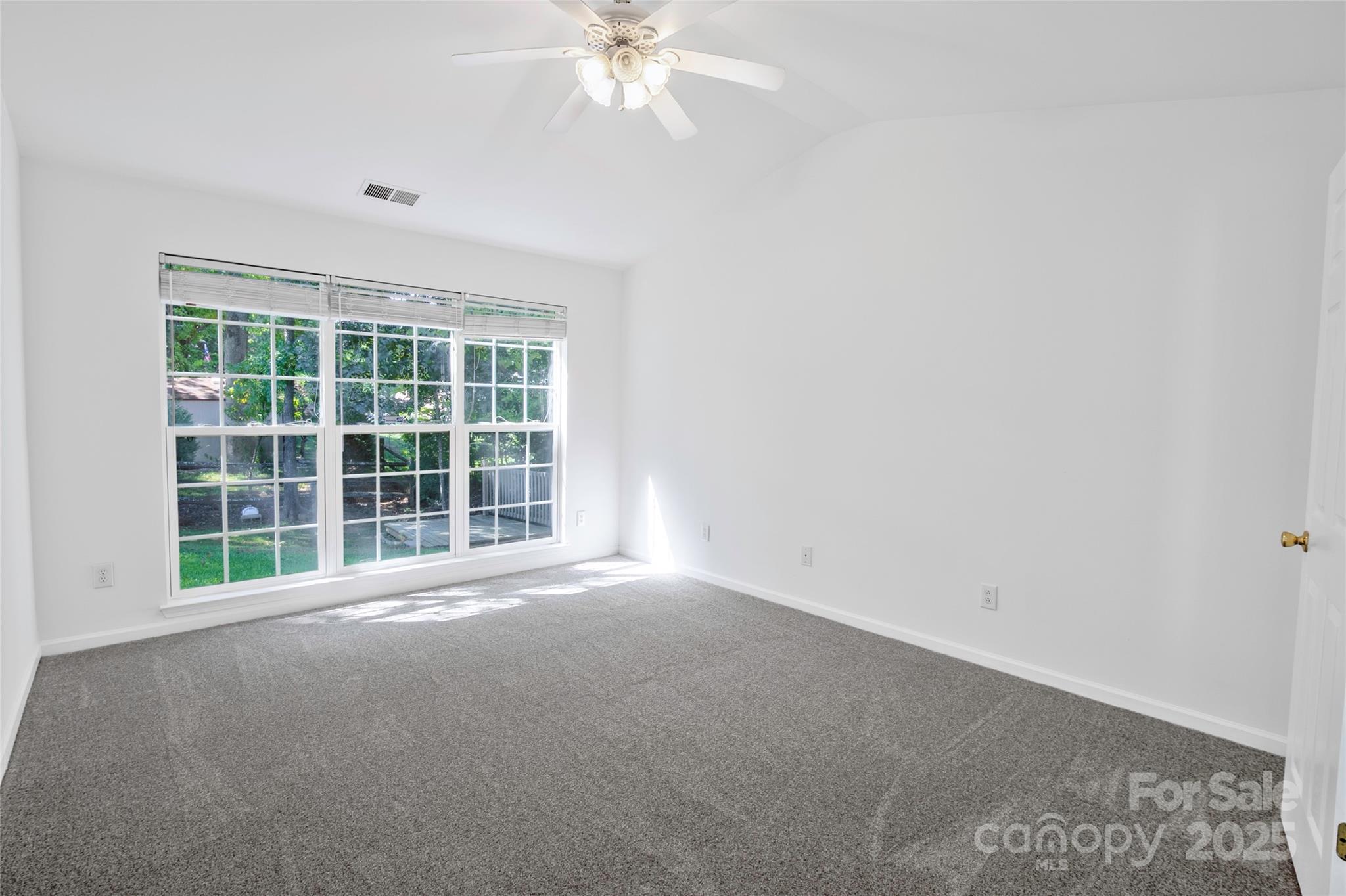 14034 Dingess Road, Unit 101 Charlotte, NC 28273 - Photo 15 of 24 a view of an empty room with a window