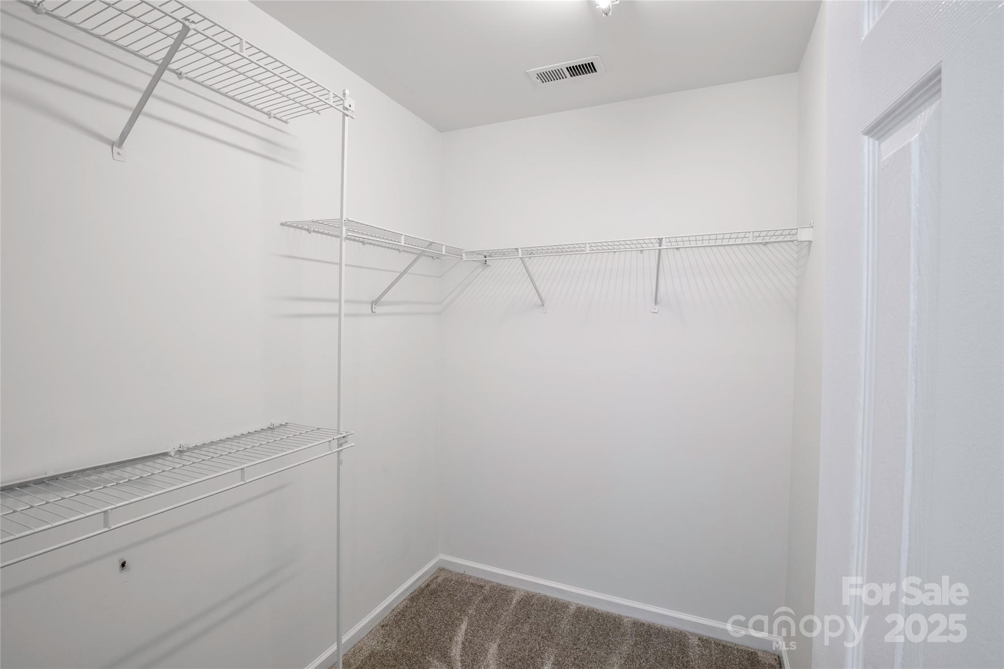 14034 Dingess Road, Unit 101 Charlotte, NC 28273 - Photo 20 of 24 a view of small space with empty racks