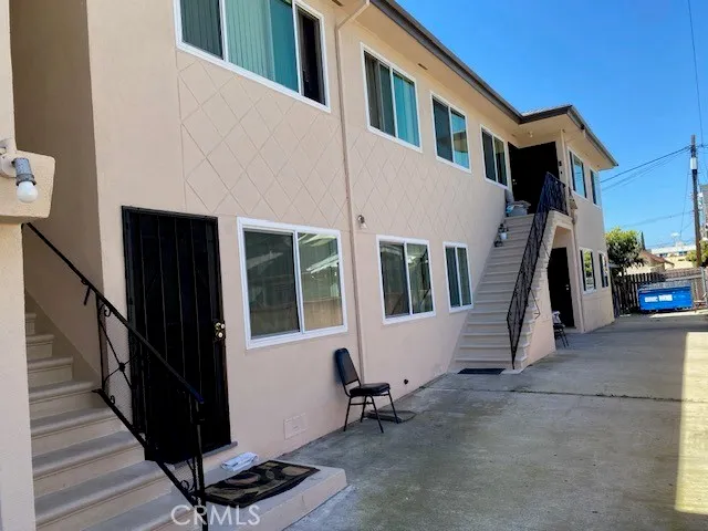 a view of a house with more windows and stairs