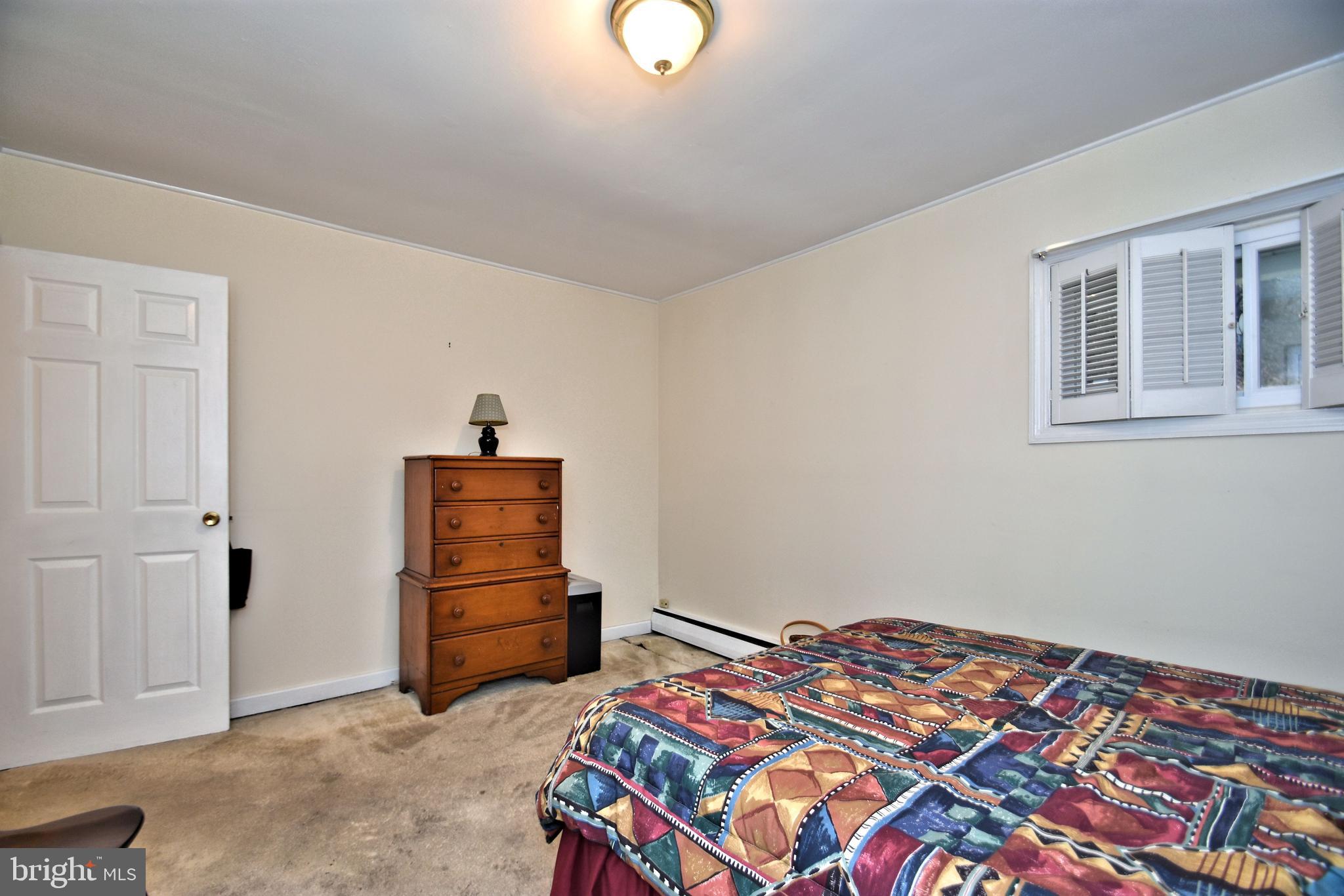 8627 Patton Road Wyndmoor, PA 19038 - Photo 23 of 31 1st floor bedroom