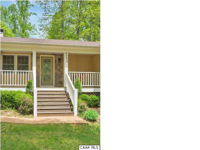 4285 Venable Road Kents Store, VA 23084 - Photo 11 of 36 a view of a house with a small yard and floor to ceiling window