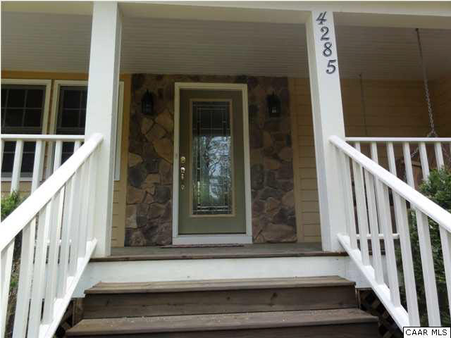 4285 Venable Road Kents Store, VA 23084 - Photo 3 of 36 a view of staircase with railing and white walls