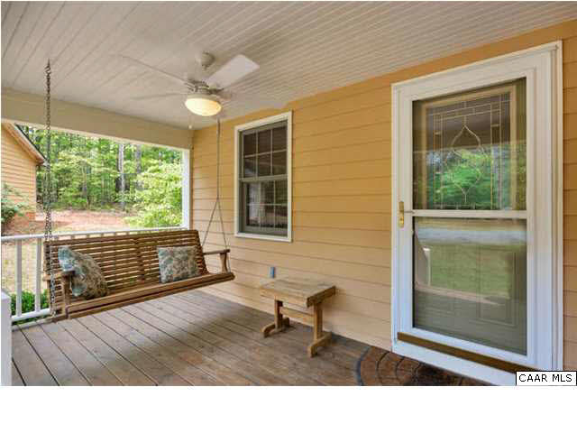 4285 Venable Road Kents Store, VA 23084 - Photo 34 of 36 a living room with a chair and a table