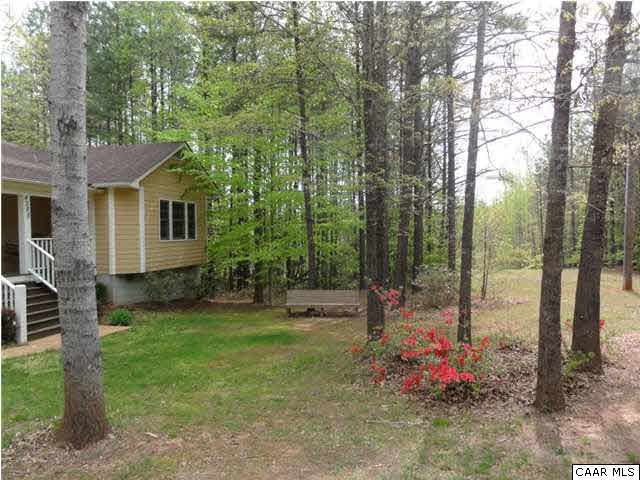 4285 Venable Road Kents Store, VA 23084 - Photo 5 of 36 a view of a backyard with garden