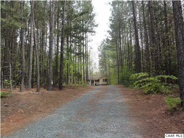 4285 Venable Road Kents Store, VA 23084 - Photo 6 of 36 a view of a field with trees in the background