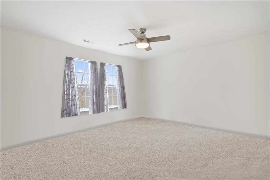 205 Wyncrest Drive Butler, PA 16001 - Photo 16 of 23 an empty room with a window