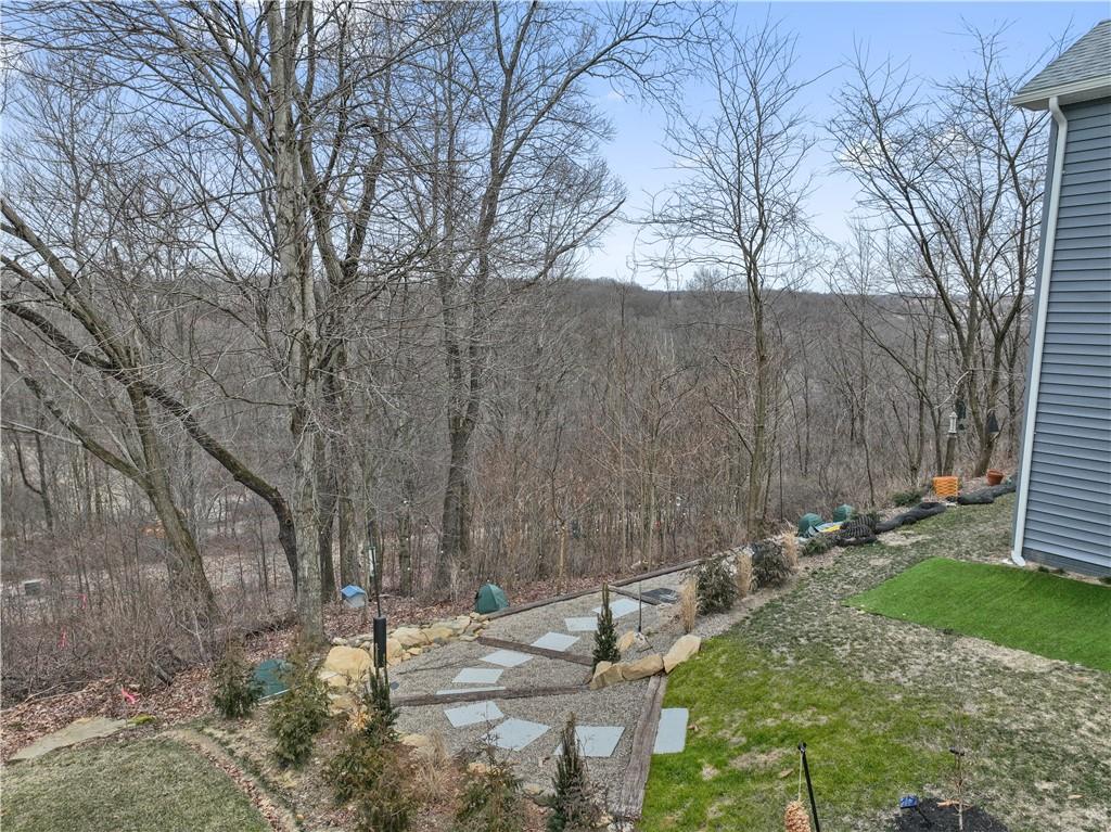 205 Wyncrest Drive Butler, PA 16001 - Photo 21 of 23 a backyard of a house with lots of green space