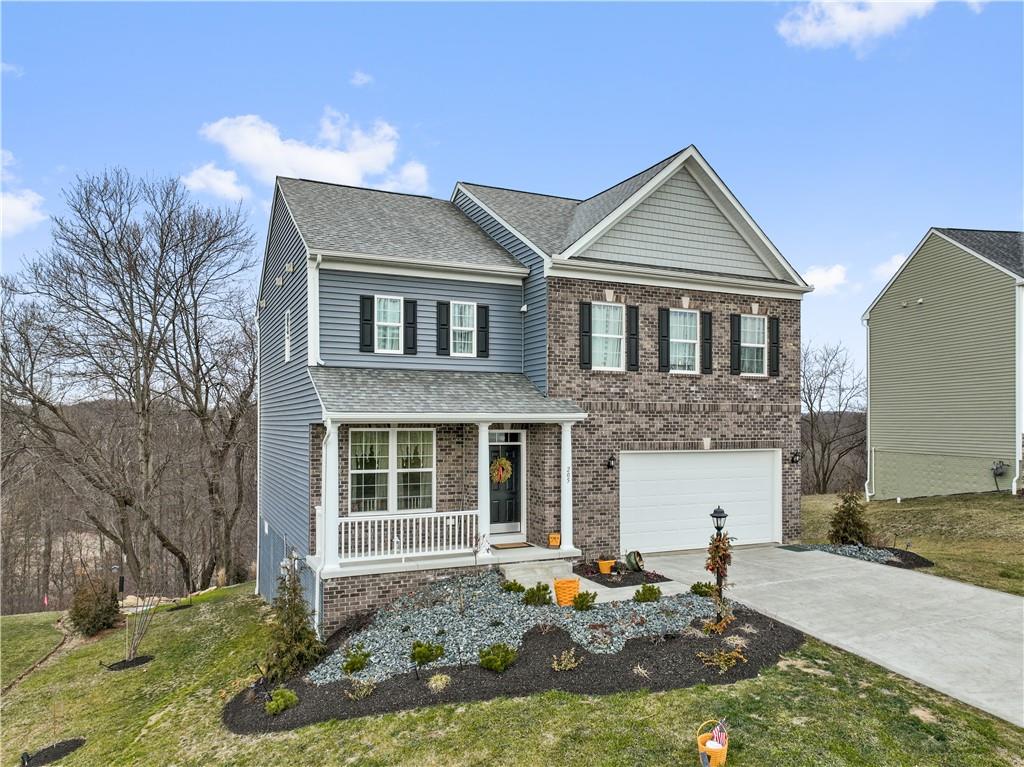205 Wyncrest Drive Butler, PA 16001 - Photo 23 of 23 a front view of a house with a yard
