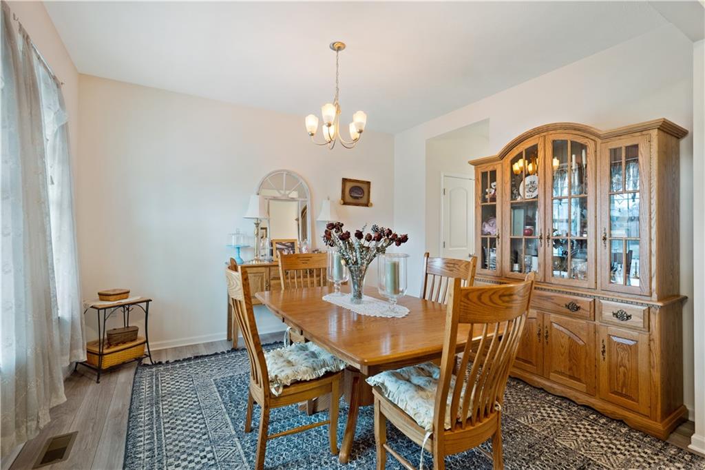 205 Wyncrest Drive Butler, PA 16001 - Photo 10 of 23 a view of a dining room with furniture window and wooden floor