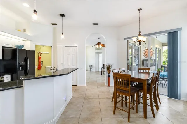 a bedroom with a bed and a mirror