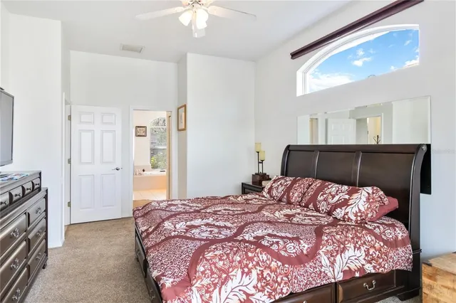 a en suite bathroom with double sink and a mirror