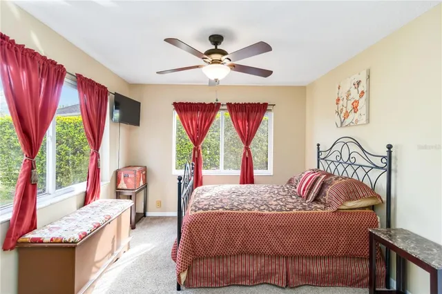 a work room with furniture and windows