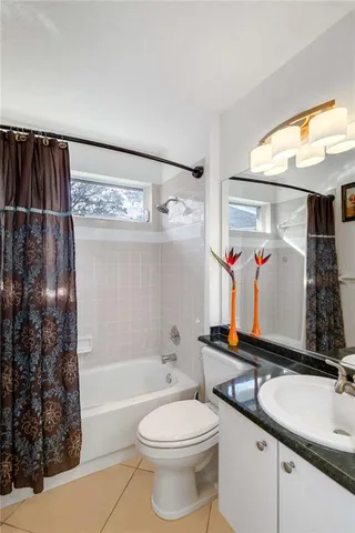 a view of a swimming pool with a yard