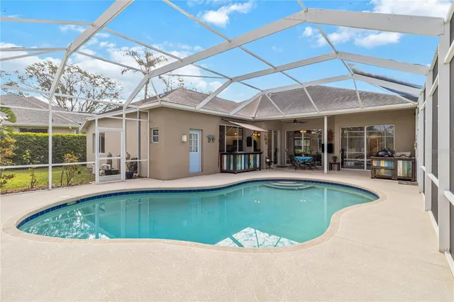 an aerial view of a house with a garden
