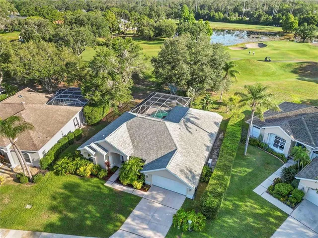 a view of a lake with a yard