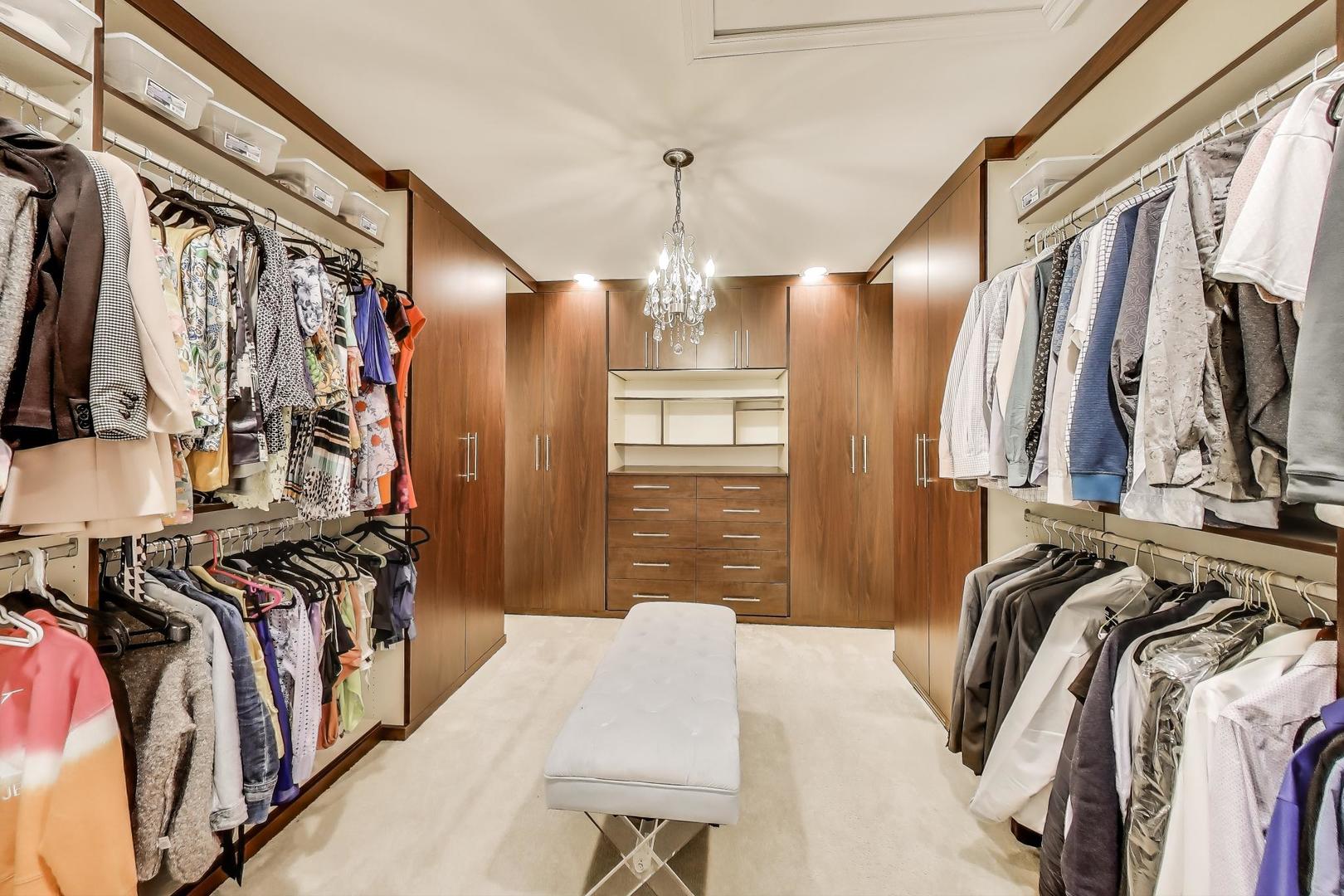 1064 Ridgeview Drive Inverness, IL 60010 - Photo 23 of 48 a view of walk in closet with clothes and shoes