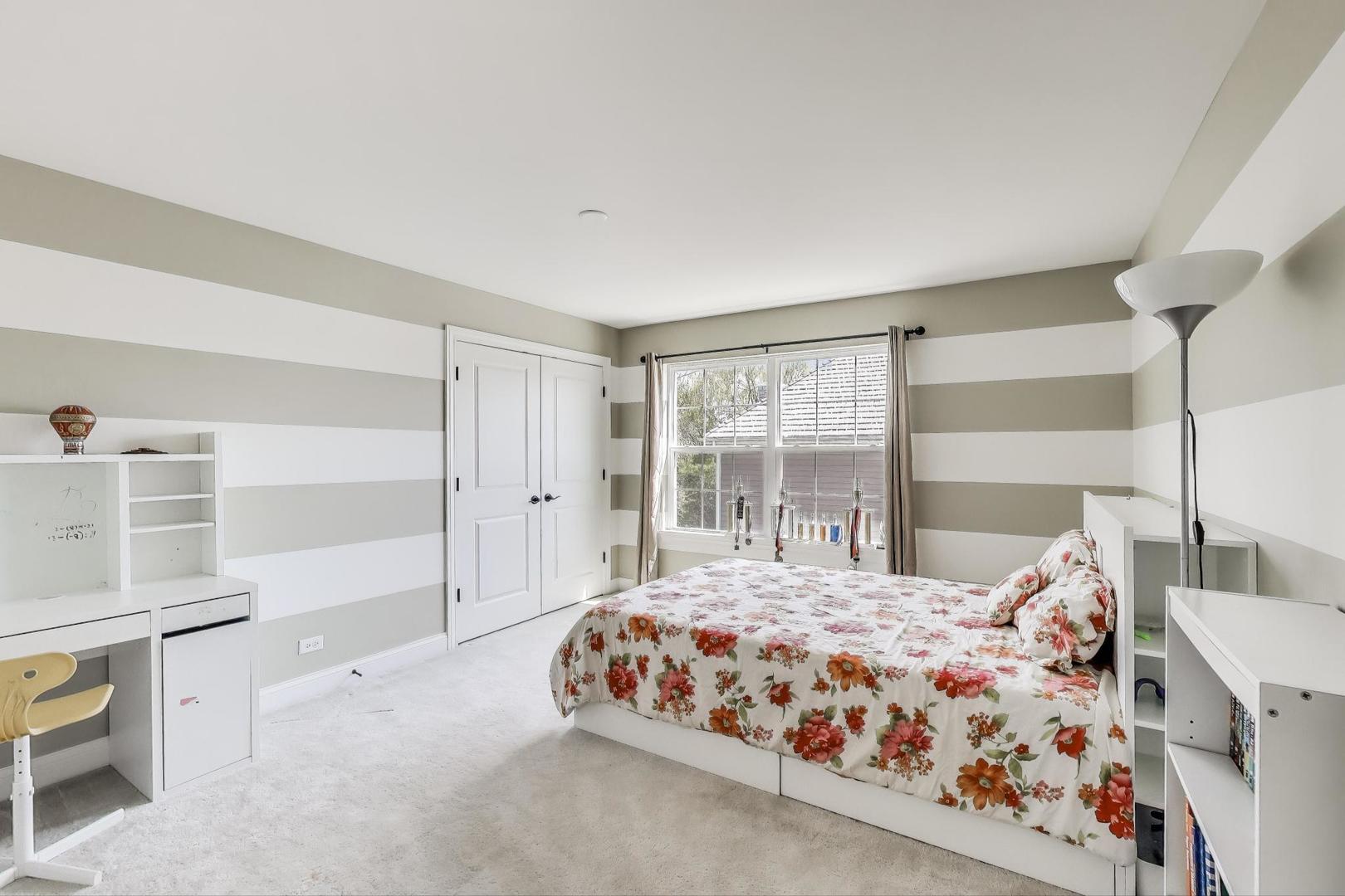 1064 Ridgeview Drive Inverness, IL 60010 - Photo 24 of 48 a bedroom with a bed and a window