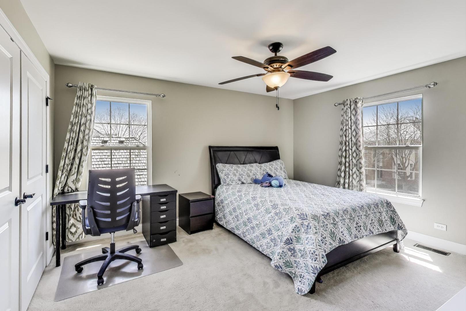 1064 Ridgeview Drive Inverness, IL 60010 - Photo 26 of 48 a bedroom with a bed furniture and a window