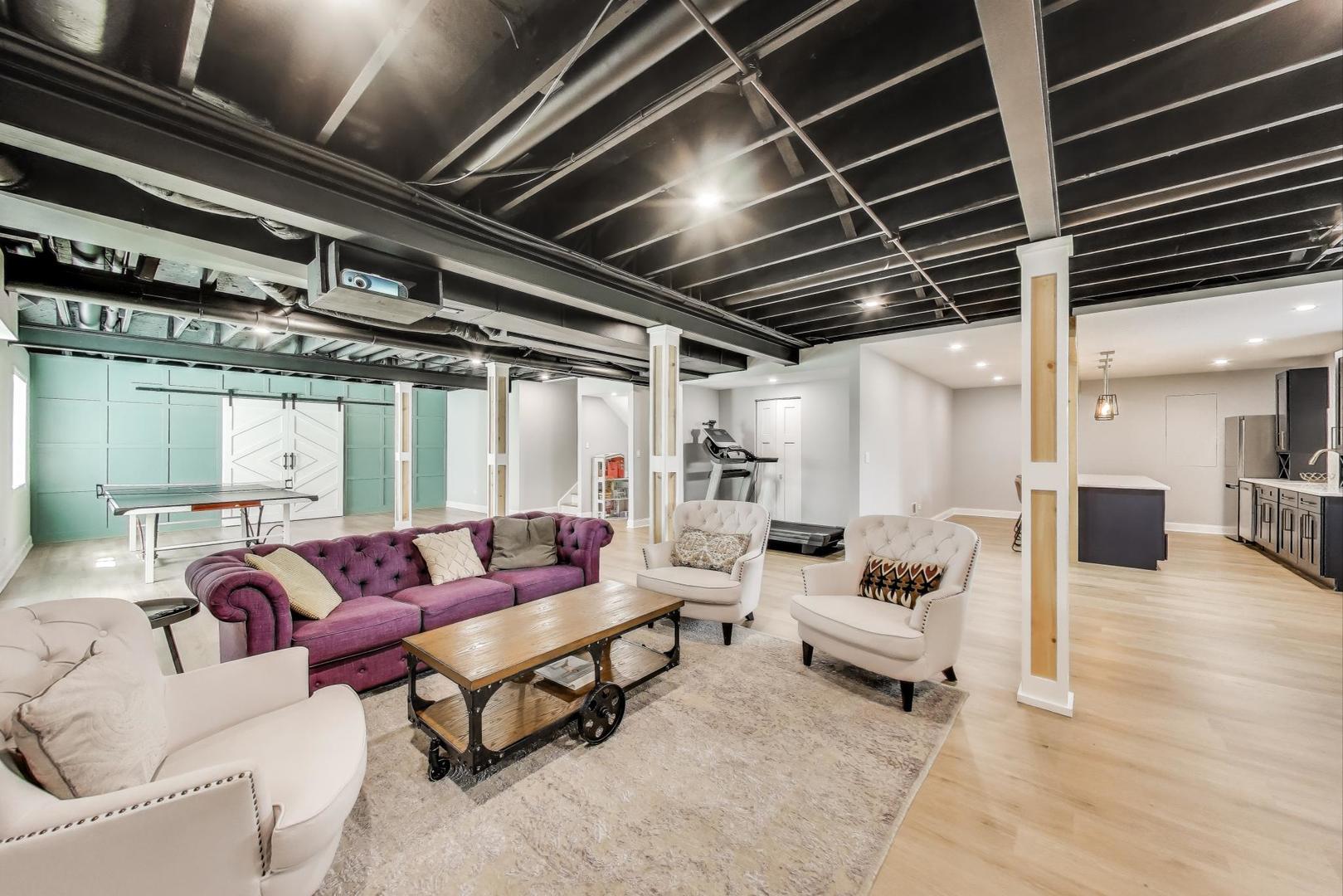 1064 Ridgeview Drive Inverness, IL 60010 - Photo 31 of 48 a living room with furniture and a chandelier