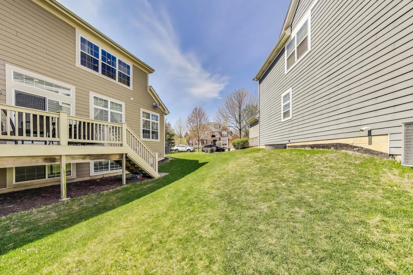 1064 Ridgeview Drive Inverness, IL 60010 - Photo 42 of 48 a front view of a house with a yard