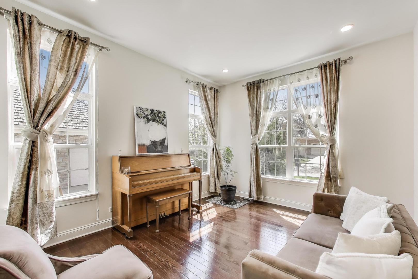 1064 Ridgeview Drive Inverness, IL 60010 - Photo 5 of 48 a living room with furniture and a window