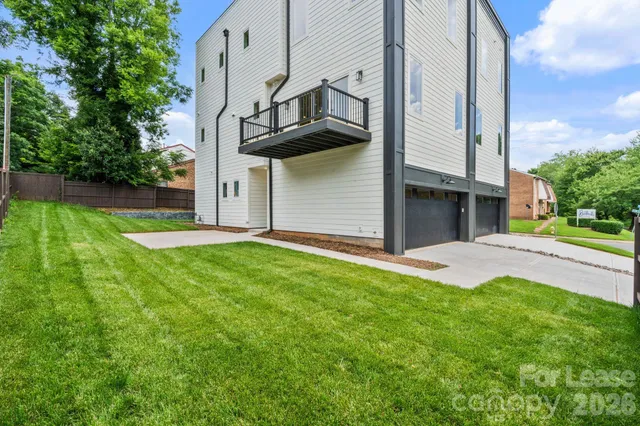 a view of a back yard of the house
