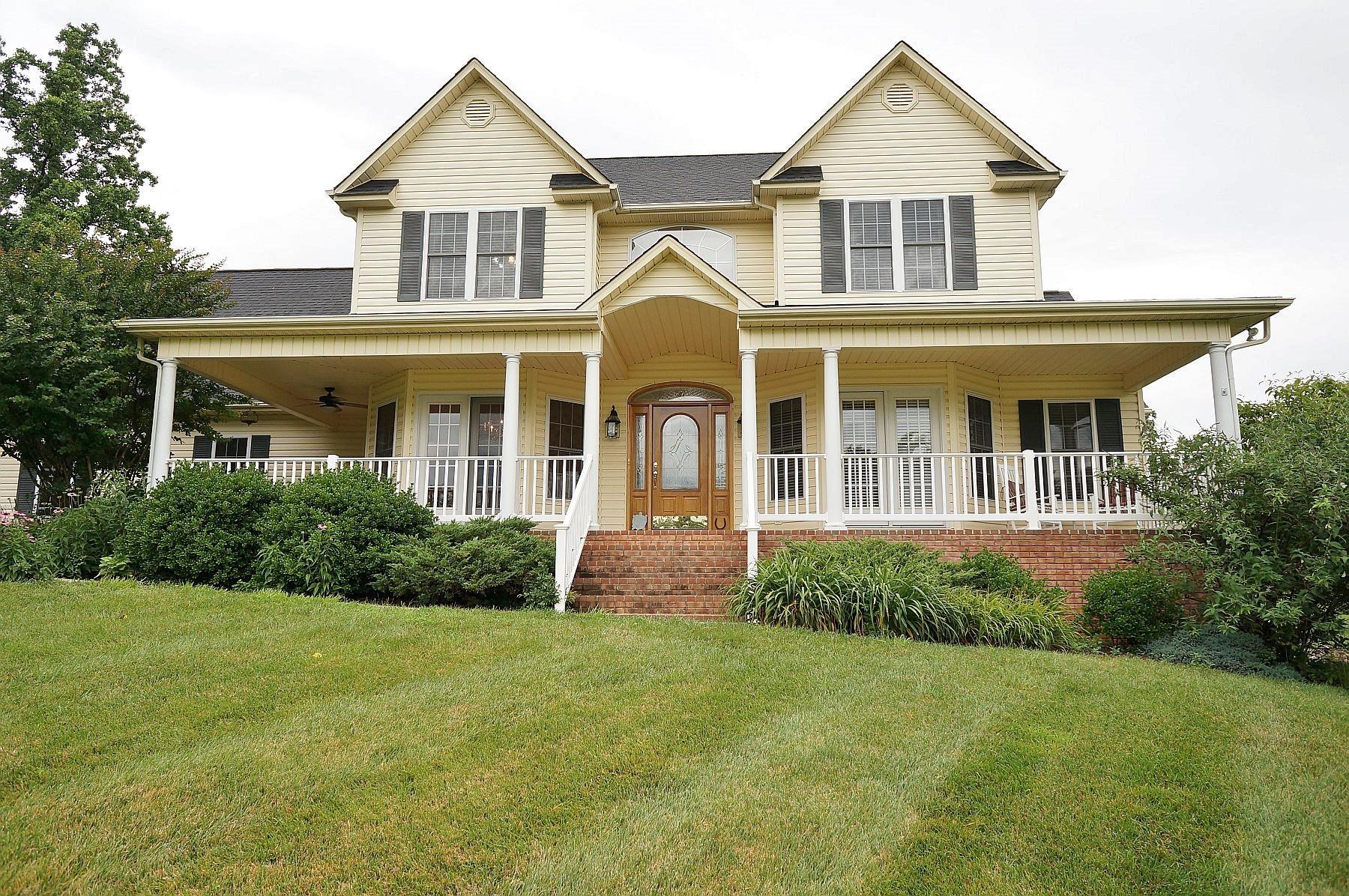 25 Claybrook Court Blue Ridge, VA 24064 - Photo 2 of 81 a front view of a house with a yard