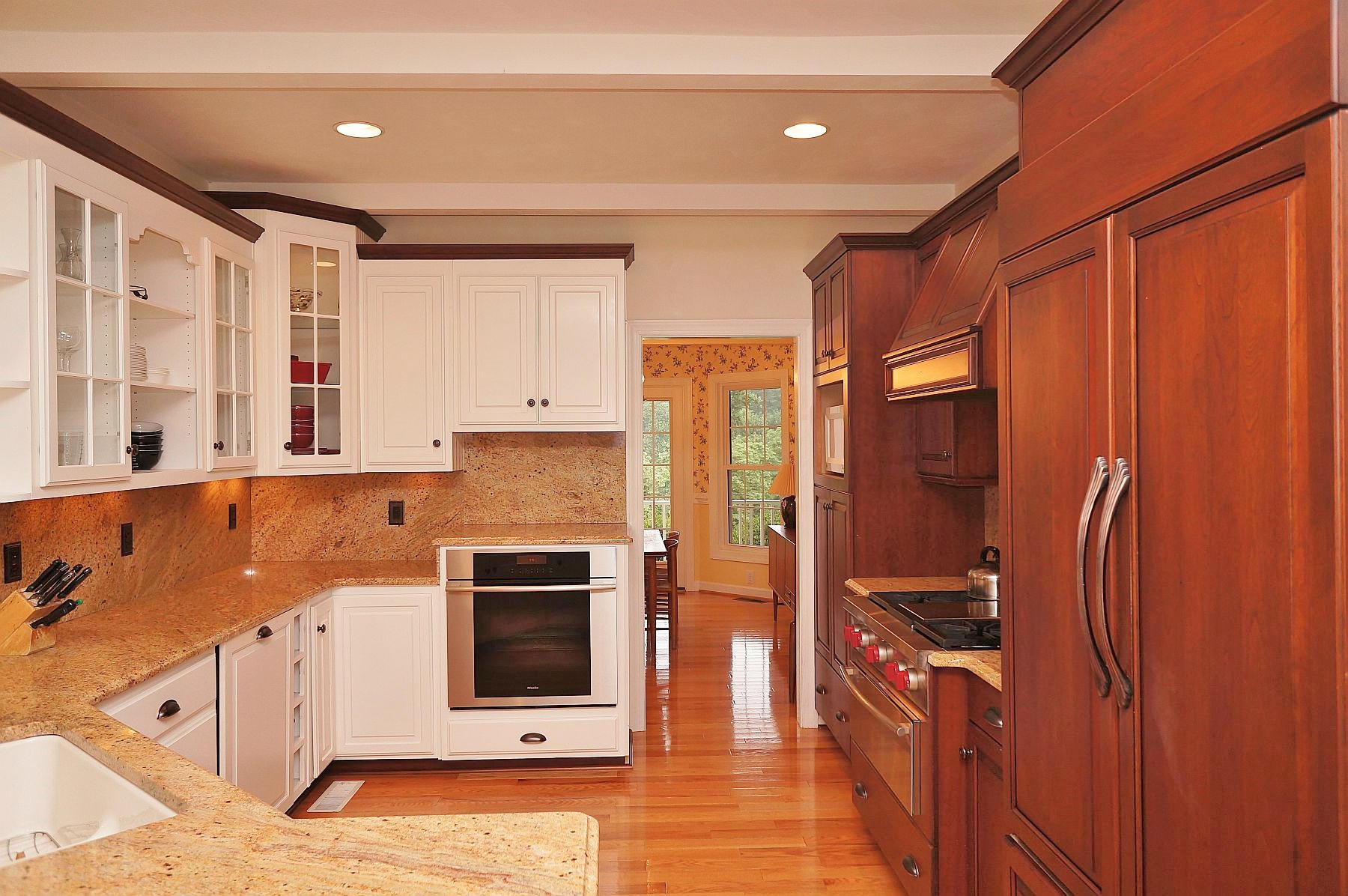 25 Claybrook Court Blue Ridge, VA 24064 - Photo 16 of 81 a kitchen with stainless steel appliances granite countertop a refrigerator a oven and white cabinets with wooden floors