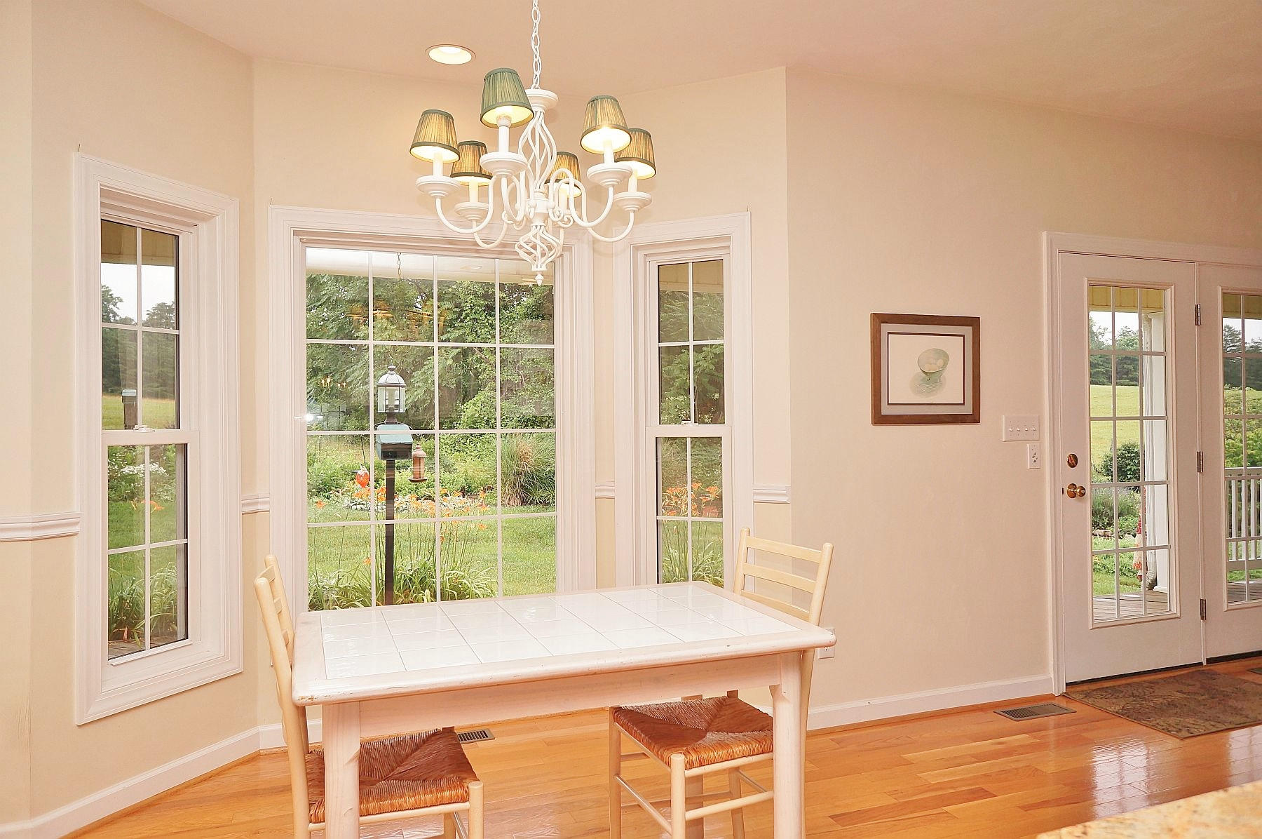 25 Claybrook Court Blue Ridge, VA 24064 - Photo 19 of 81 a view of a dining room with furniture a chandelier and wooden floor