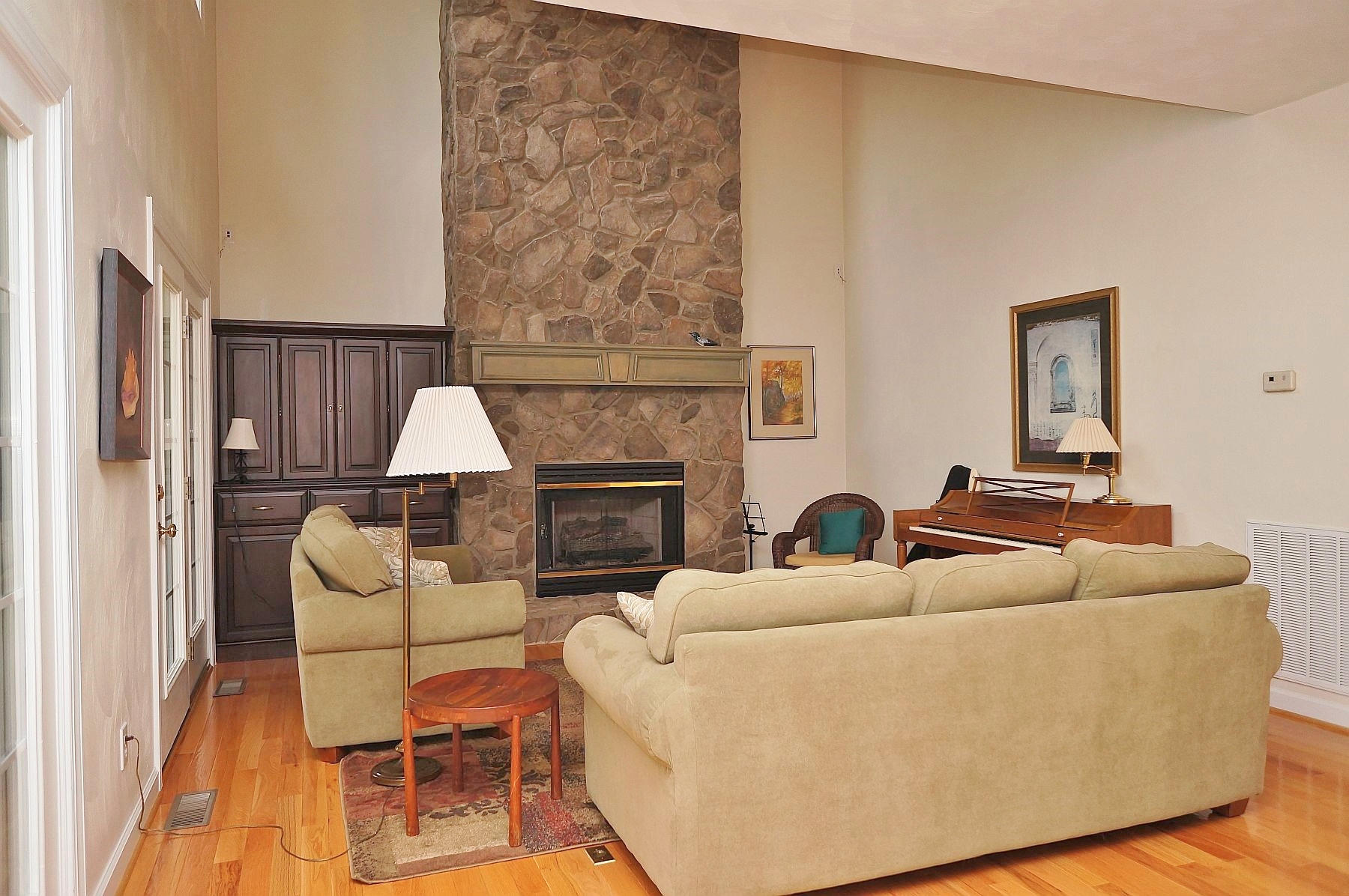 25 Claybrook Court Blue Ridge, VA 24064 - Photo 26 of 81 a living room with furniture a fireplace and a large window