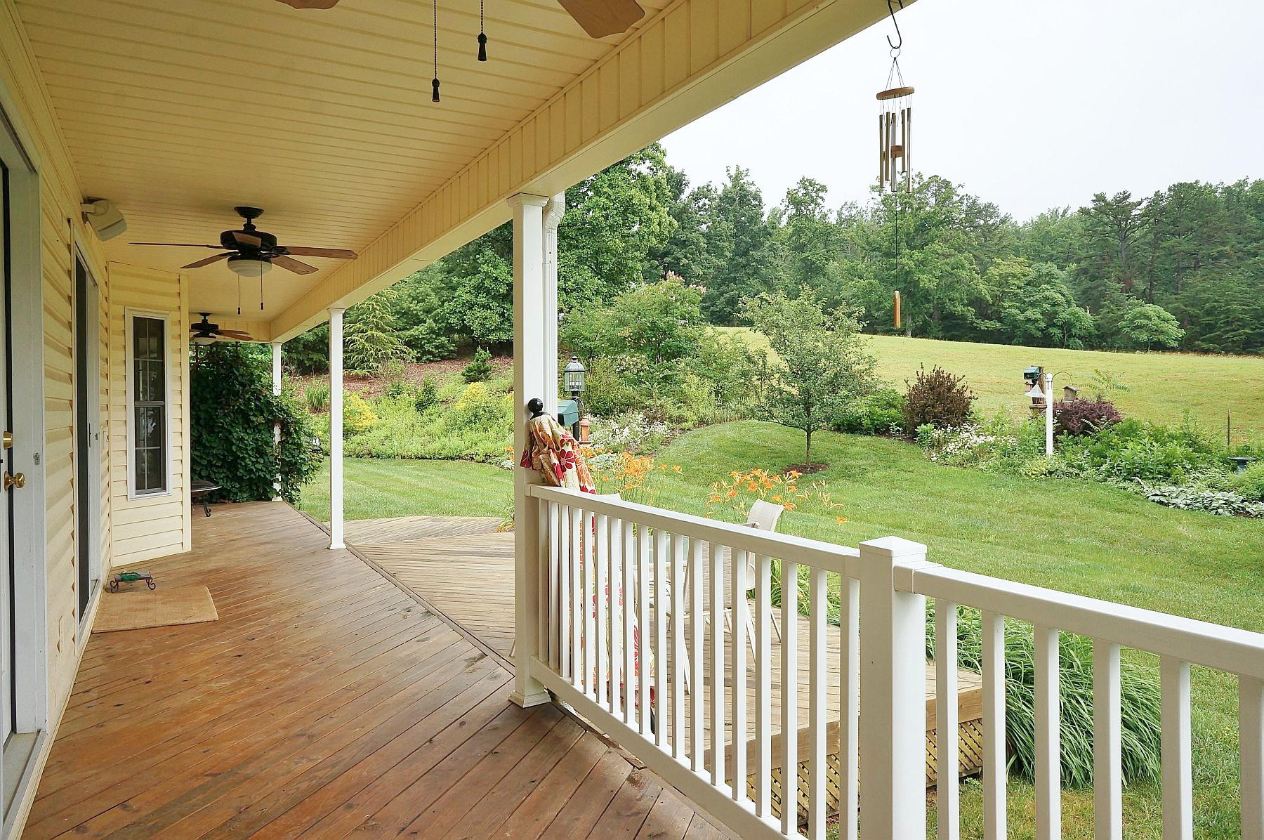 25 Claybrook Court Blue Ridge, VA 24064 - Photo 42 of 81 a view of a porch with wooden floor and yard