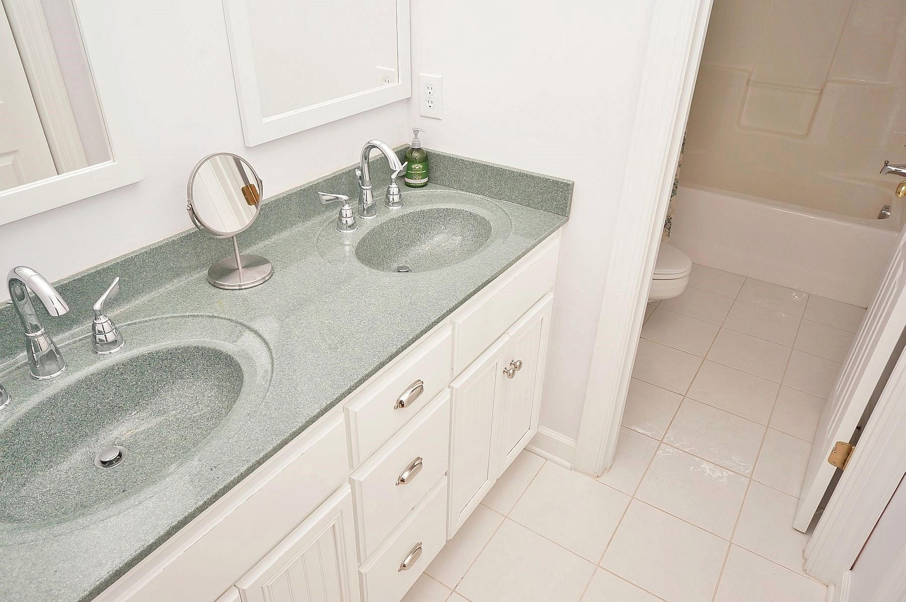 25 Claybrook Court Blue Ridge, VA 24064 - Photo 53 of 81 a bathroom with a granite countertop sink and a mirror