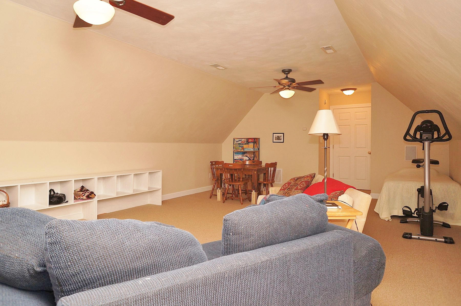 25 Claybrook Court Blue Ridge, VA 24064 - Photo 57 of 81 a living room with furniture and a chandelier