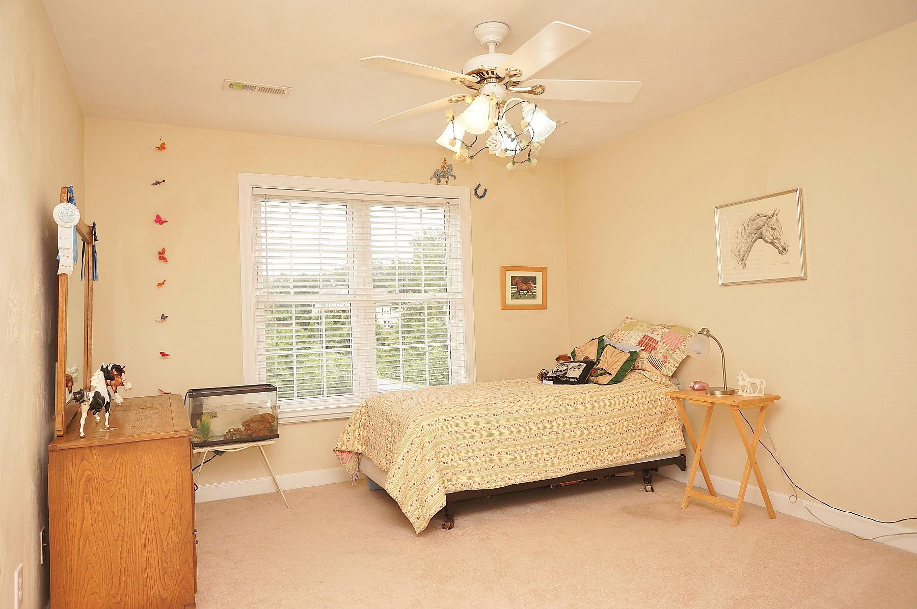25 Claybrook Court Blue Ridge, VA 24064 - Photo 58 of 81 a bedroom with a bed and a chandelier