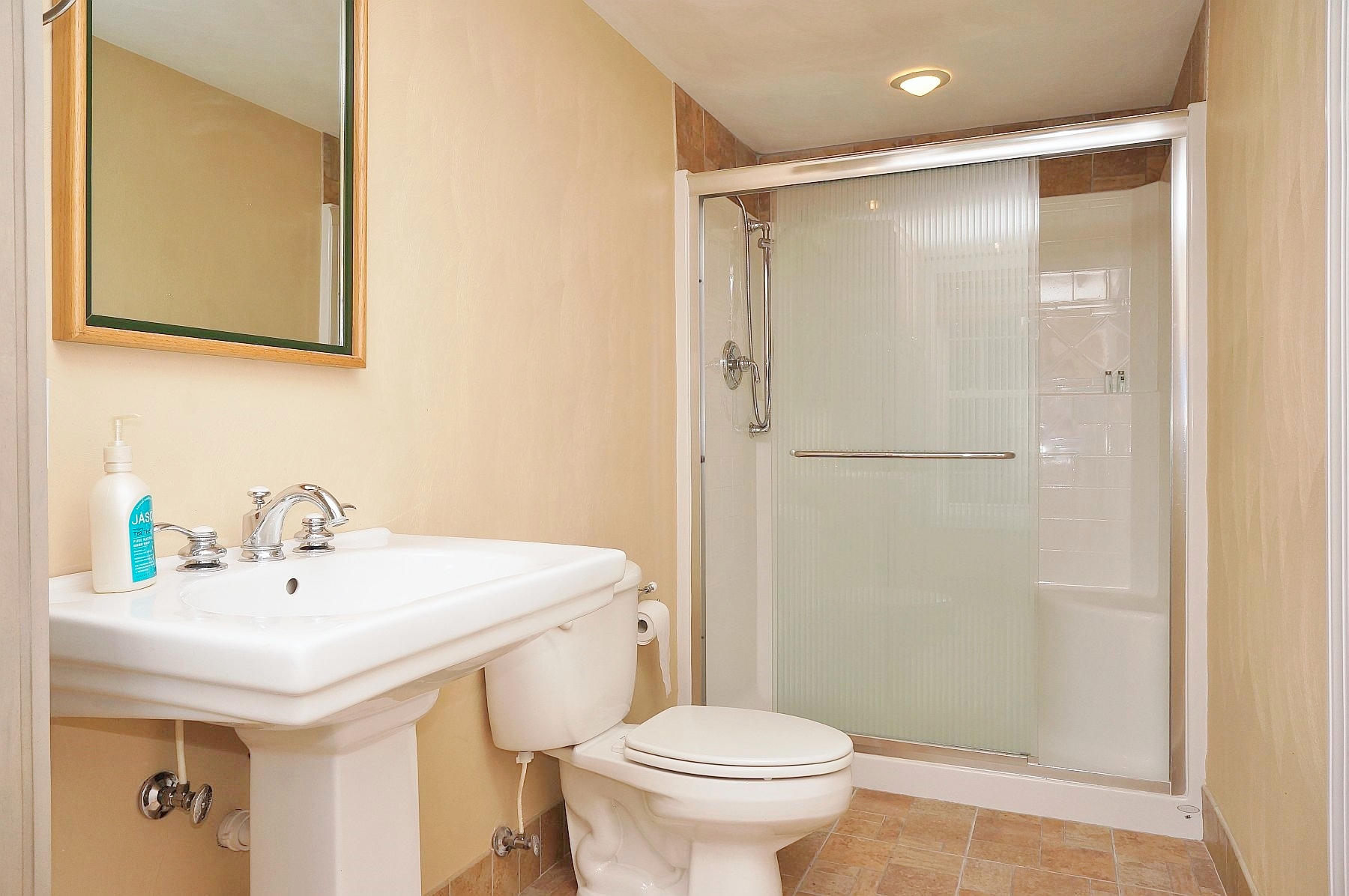 25 Claybrook Court Blue Ridge, VA 24064 - Photo 65 of 81 a bathroom with a sink toilet and shower