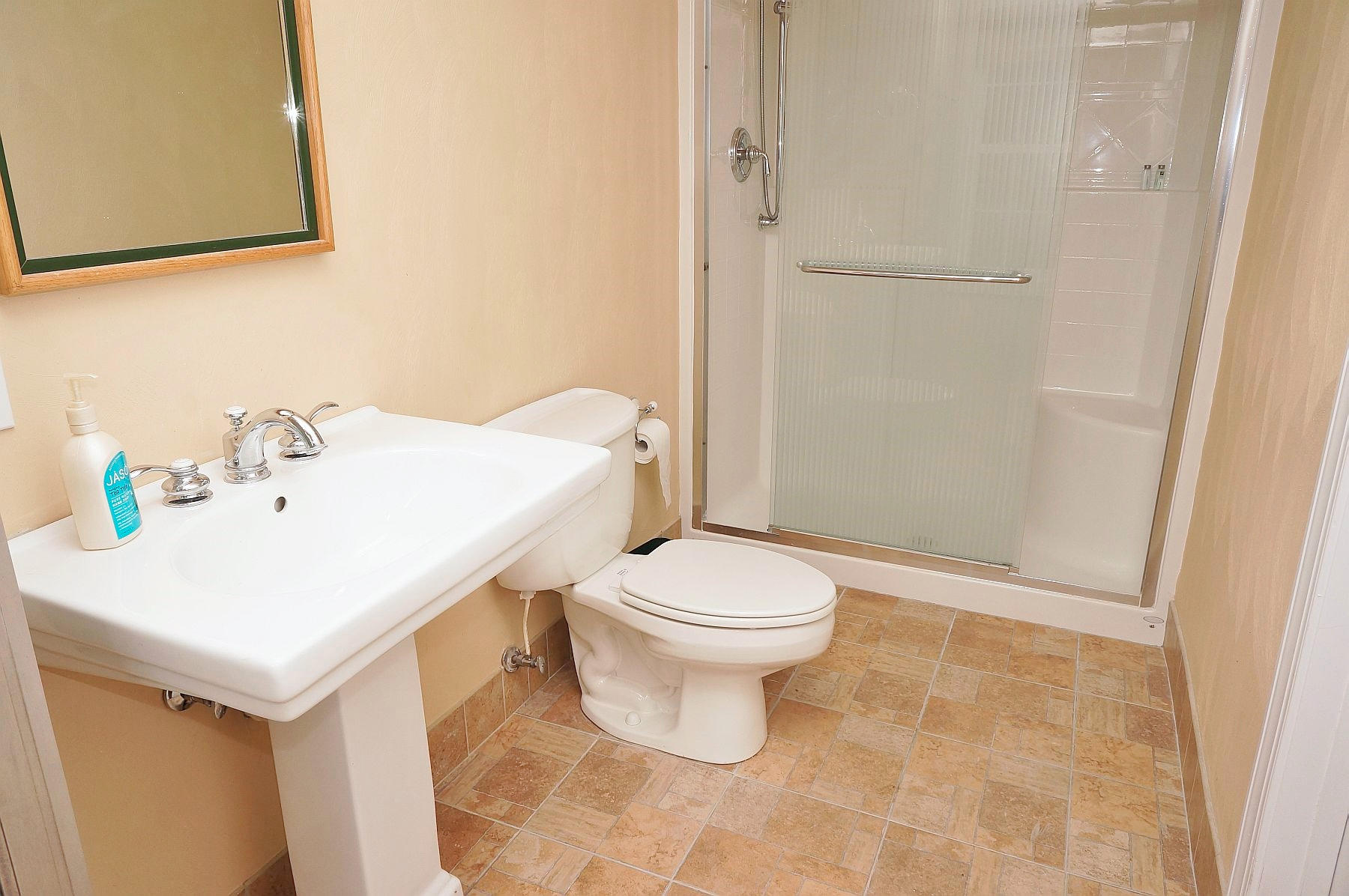 25 Claybrook Court Blue Ridge, VA 24064 - Photo 66 of 81 a white toilet sitting next to a bathroom sink