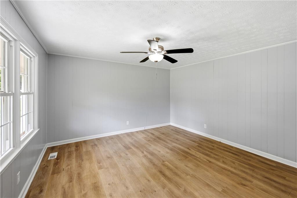 300 Cash Town Road Aragon, GA 30104 - Photo 8 of 28 wooden floor in an empty room with a window