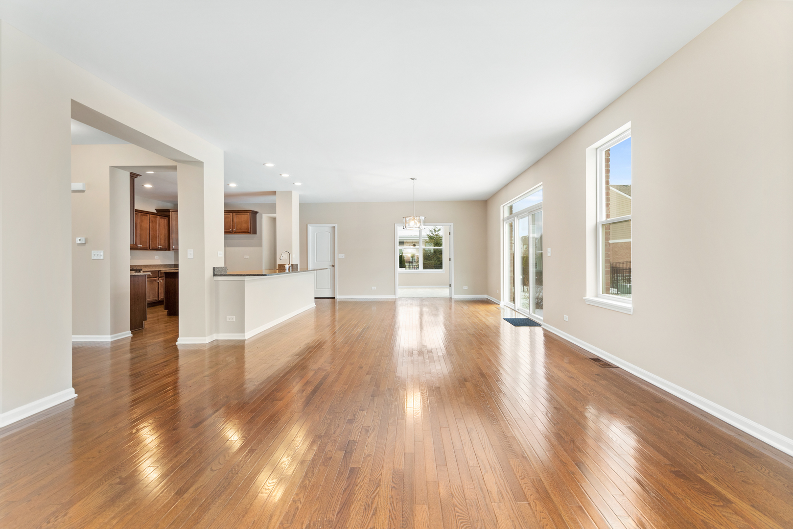 2018 Stapleton Road New Lenox, IL 60451 - Photo 12 of 40 a view of empty room with kitchen and window