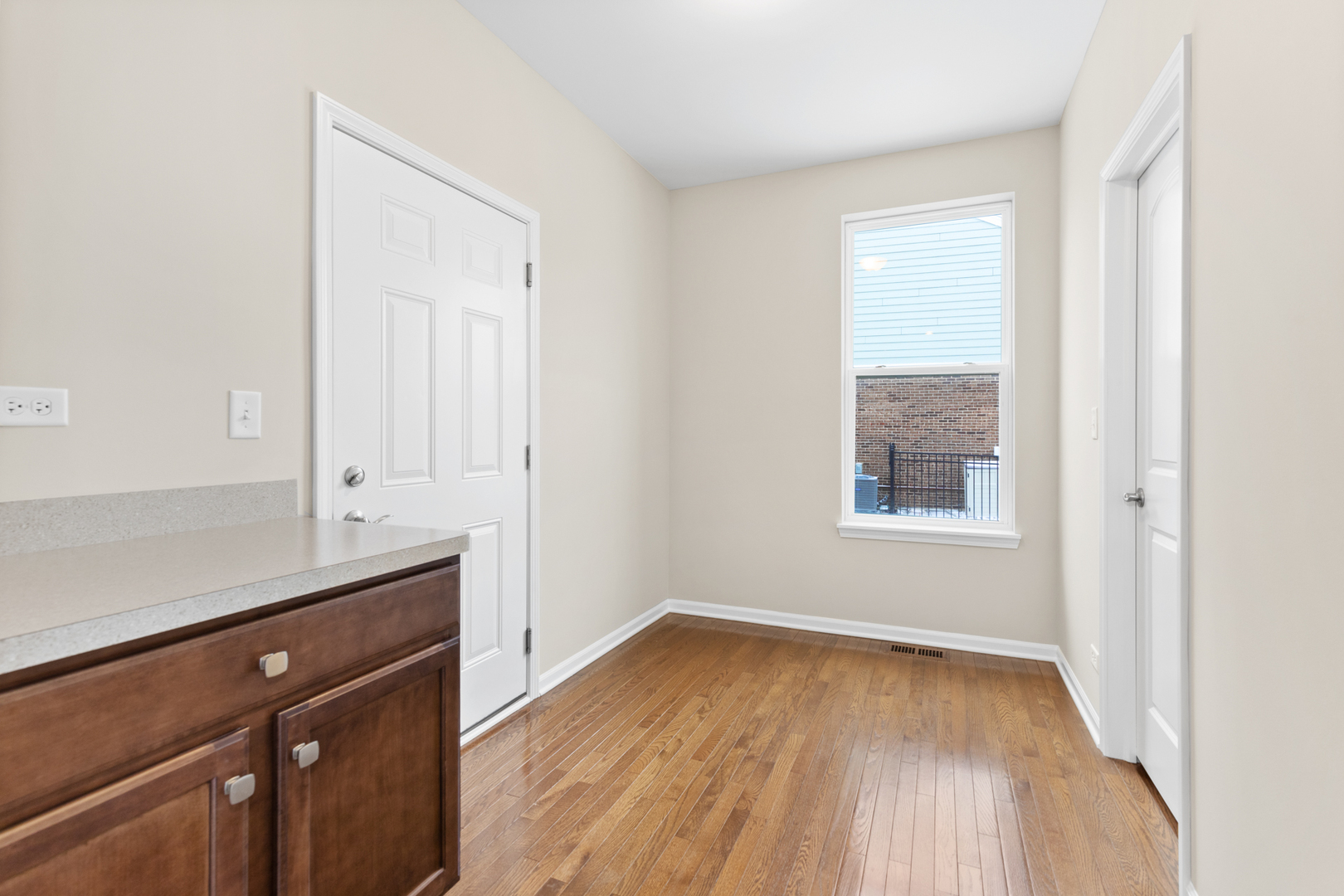 2018 Stapleton Road New Lenox, IL 60451 - Photo 18 of 40 an empty room with wooden floor and window