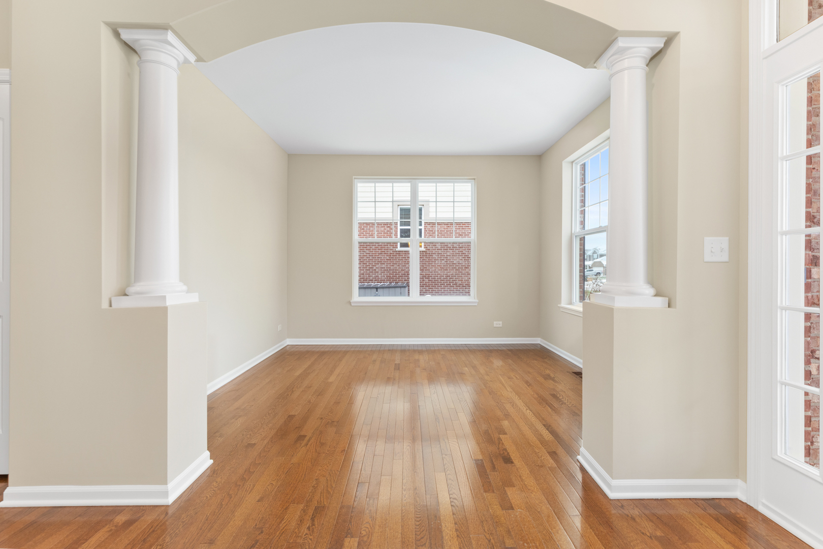 2018 Stapleton Road New Lenox, IL 60451 - Photo 5 of 40 an empty room with wooden floor and windows