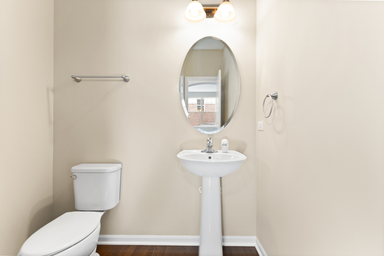 2018 Stapleton Road New Lenox, IL 60451 - Photo 8 of 40 a bathroom with a toilet a sink and mirror