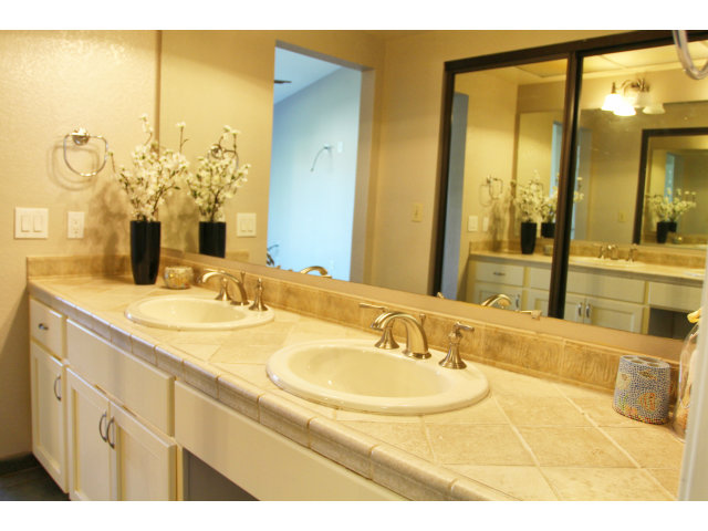 712 Superior Road Milpitas, CA 95035 - Photo 11 of 20 a bathroom with a sink and a mirror