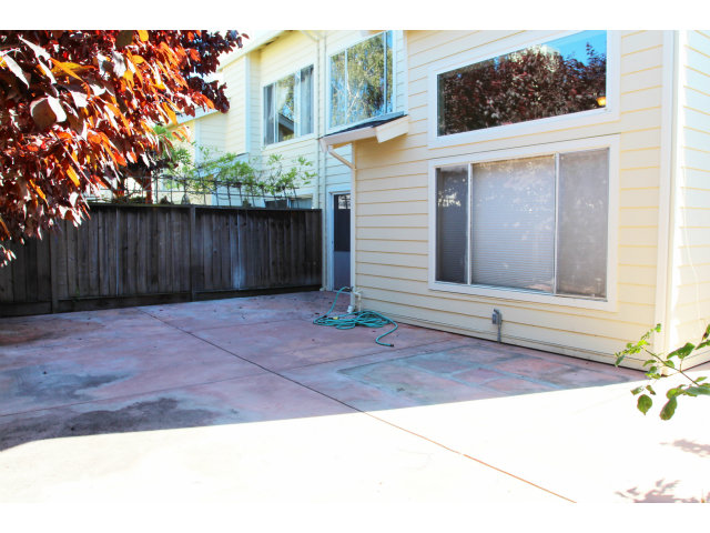 712 Superior Road Milpitas, CA 95035 - Photo 16 of 20 a view of a backyard with a large tree
